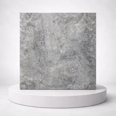 Prime Silver Travertine on a mantle.